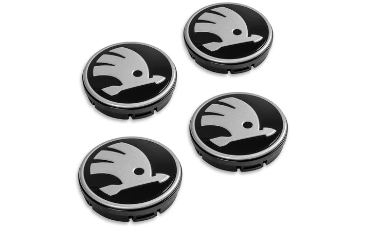 Set capace roti Skoda, universale, 4 bucati, din plastic rezistent, finisaj argintiu, compatibile cu majoritatea modelelor Skoda cu roti din otel.